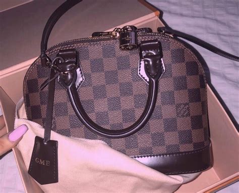 louis vuitton alma fake vs real|false louis vuitton alma.